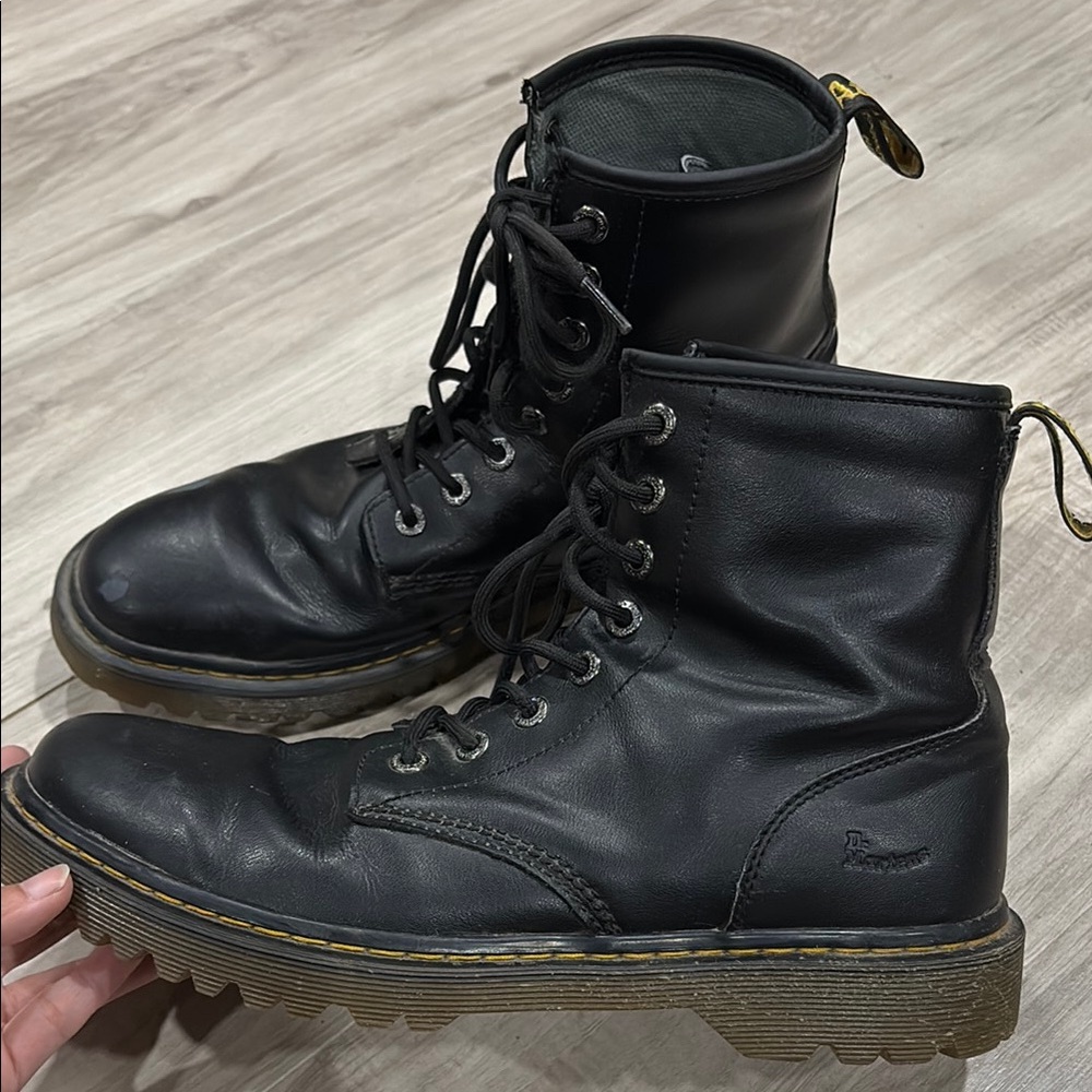 Dr. Martens Black Leather Combat Boots with Lace-Up Design